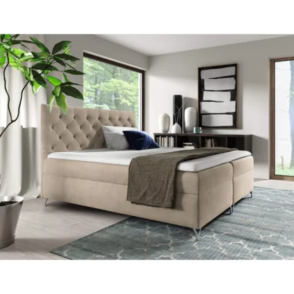 Boxspringová posteľ GULIETTE v béžovej látke Velvet s rozmermi 160x200 v elegantnej spálni.