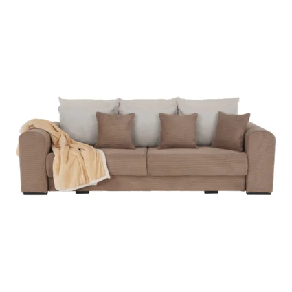 Extra priestranná pohovka GILEN BIG SOFA v svetlohnedej, béžovej a krémovej farbe s vankúšmi a dekou.