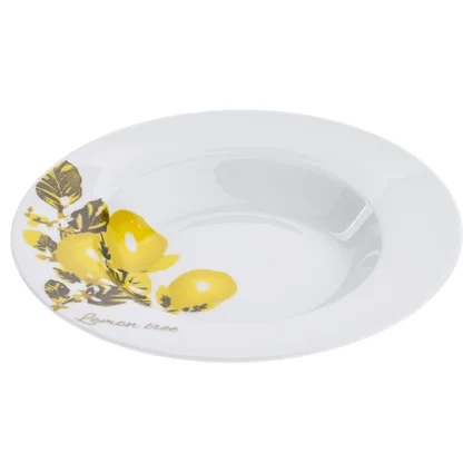 Biely porcelánový tanier s dekoráciou citrónov a listov.