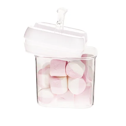 Plastová dóza s viečkom, naplnená ružovo-bielymi marshmallow cukríkmi